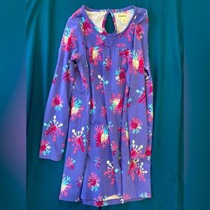 Girls frozen theme dress. Size 8, purple with colorful snowflakes